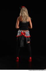 CHRISTY STANDING POSE WITH RED APPLE